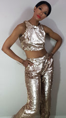 Nicole Spruill, gold sequin two piece pant suit, crop top 