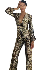 A woman wearing a Nik Spruill Savage Sheen leopard print jumpsuit.