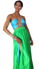 A woman in a green and blue Nik Spruill Love Color Block Chain Link Dress.