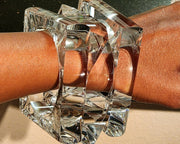 A close up of a person's arm wearing a Nik Spruill GLAZE bracelet.