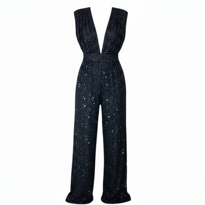 A woman in a Nik Spruill Glitz Sequined Jumpsuit - Black posing for a picture.