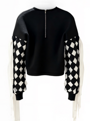 Black sweater with checkered sleeves on a white background