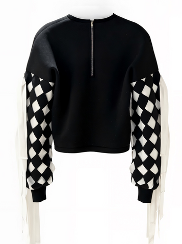 Black sweater with checkered sleeves on a white background
