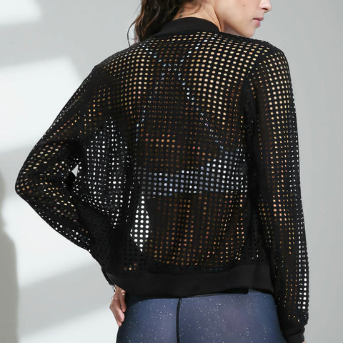 Black mesh jacket worn by a person on a light gray background