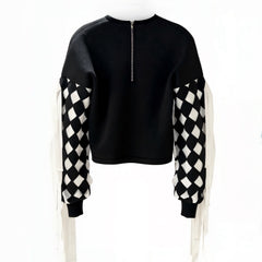 Black sweater with checkered sleeves on a white background
