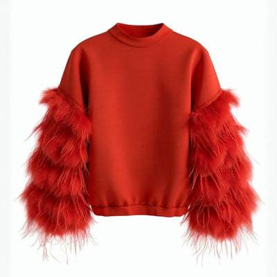 A front view product photo of the Nik Spruill AIR SPACE RED TOP feathered sleeves top in red.