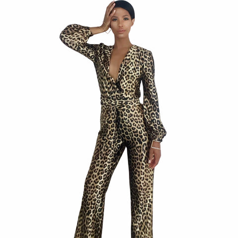 Woman wearing a leopard print jumpsuit on a white background