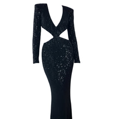 Black sequin evening gown with long sleeves on a white background