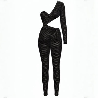 Black polka dot jumpsuit on a white background