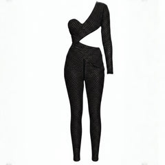 Black polka dot jumpsuit on a white background