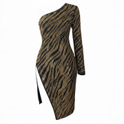 Gold and black zebra patterned one-shoulder dress on a white background