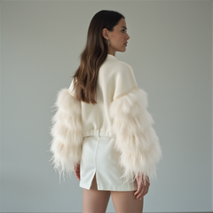model in a white neoprene sweatshirt with feather sleeves and back zipper back view 