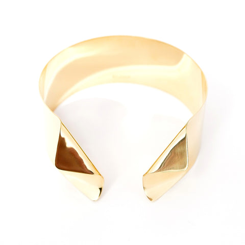 A close up of a Nik Spruill AGOJI bracelet on a white background.