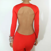 back view, red jumpsuit model Nicole Spruill Nik Spruill brand One Strut Models ready-to-wear collection