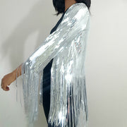 A woman wearing a Nik Spruill SIVA STEEL SEQUIN FRINGE JACKET.