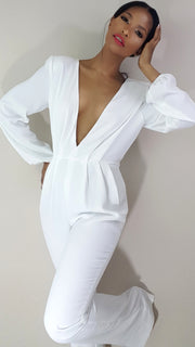 Nicole spruill, fashion designer nicole spruill, white jumpsuit hand on hip