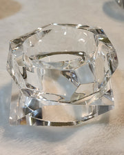 A Nik Spruill GLOSS sitting on top of a white table.