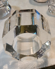 A set of GLACIER clear crystal bangles on a table. (Brand Name: Nik Spruill)