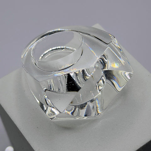 A YIZ object sitting on top of a white surface, by Nik Spruill.