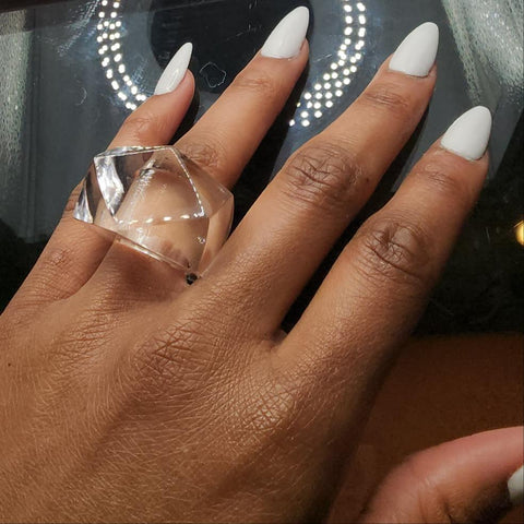 A woman's hand with a Nik Spruill ITGA ring on it.