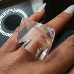 A woman's hand with a Nik Spruill IMAK ring on it.