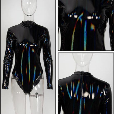 A mannequin wearing a shiny black NIKKI 6 TOP by Nik Spruill bodysuit.