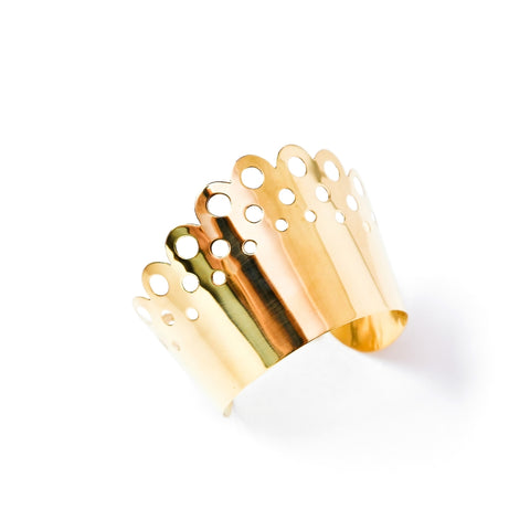 A close up of a Nik Spruill DAHOMEY CUFF on a white background.