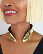 A close up of a person wearing a Nik Spruill AGOJI necklace.