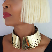 A close up of a person wearing a Nik Spruill DAHOMEY necklace.