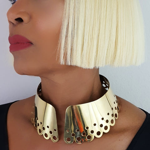 A close up of a person wearing a Nik Spruill DAHOMEY necklace.