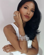 A woman in a white dress posing for a picture with her Nik Spruill GALAXY.