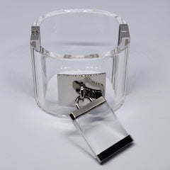 A "DROP - SILVER" cuff bracelet with a metal clasp by Nik Spruill.