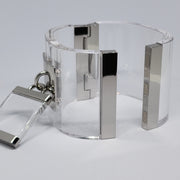 a DROP - SILVER cuff bracelet with a metal clasp by Nik Spruill.