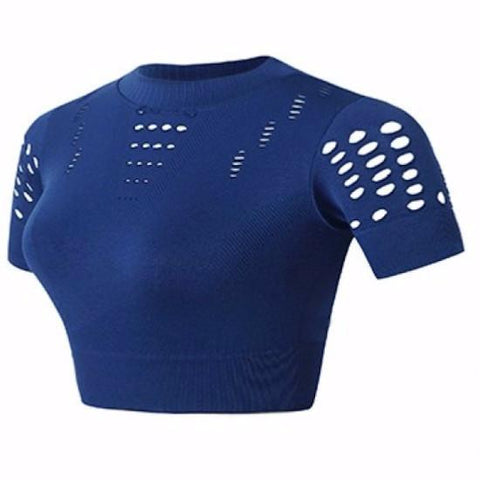 The REBEL BLUE CROP TOP by Nik Spruill is a stylish blue cropped shirt designed with a perforated pattern on the sleeves and upper chest, complemented by a ribbed crew neckline. Its breathable fabric offers a seamless fit, making it ideal for any casual outing.