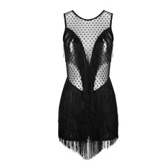 A Nik Spruill Lauren Fringe Romper - black with white polka dots.