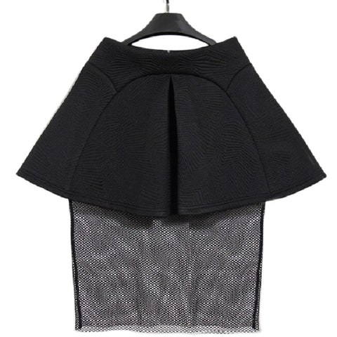 A Nik Spruill Spectator Skirt hanging on a hanger.