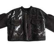 A Nik Spruill COMPLETION JACKET with a zipper on it.