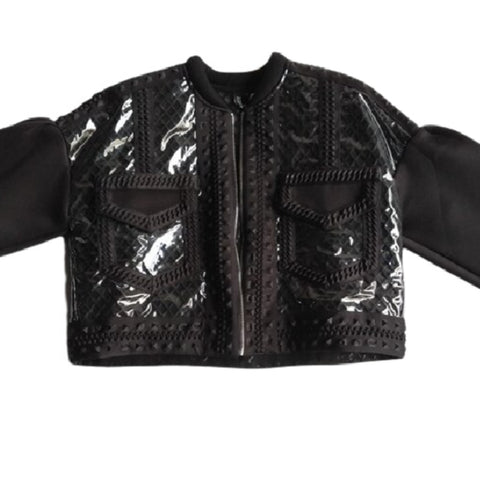 A Nik Spruill COMPLETION JACKET with a zipper on it.