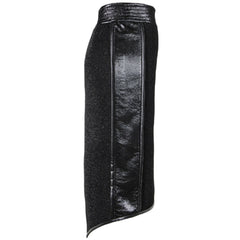 A Nik Spruill Freedom exotic leather midi skirt with a zipper on the side.