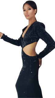 A woman in a Nik Spruill Aja Sequined Cut Out Dress - Black posing for a picture.