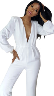model in a White long sleeve jumpsuit by Nik Spruill