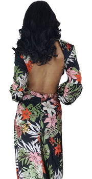 The back of a woman wearing a Nik Spruill Shanti cutout flower maxi dress.