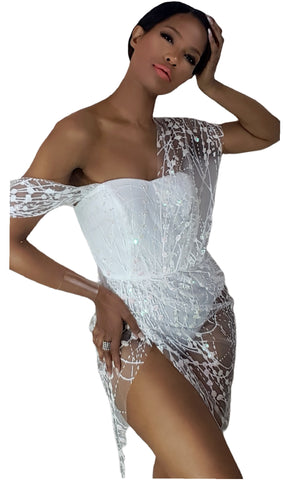 A woman in a Nik Spruill Truth Draped Crochet Midi Dress - White posing for a picture.