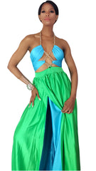 A woman in a Nik Spruill Love Color Block Chain Link Dress in green and blue.
