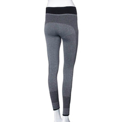 A woman's BULLSEYE LEGGING in grey and black by B'nand.