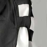 a Nik Spruill CHECKMATE FRINGE JACKET with a white bow.