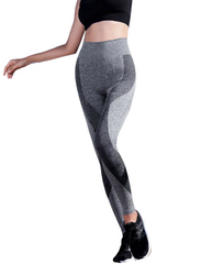 A woman in a black top and YABEI X Moves Athletix COLOR BOLT HIGH WAIST LEGGING GRAY.
