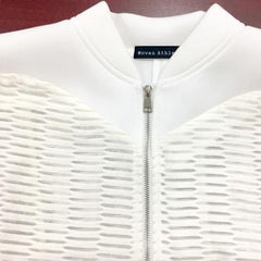 A Nik Spruill Conscious Jacket with a zipper on it.