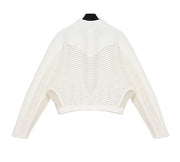 A Nik Spruill CONSCIOUS JACKET with a black collar.