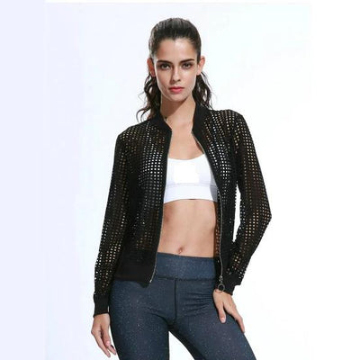 a woman in a Moves Athletix EFFORTLESS MOTION JACKET and leggings.